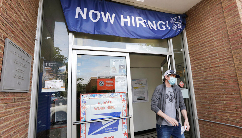 Hiring Soared in May as Mass Layoffs Eased
