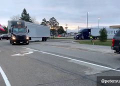 Trucks Carrying COVID-19 Vaccine Roll Out from Michigan Pfizer Plant