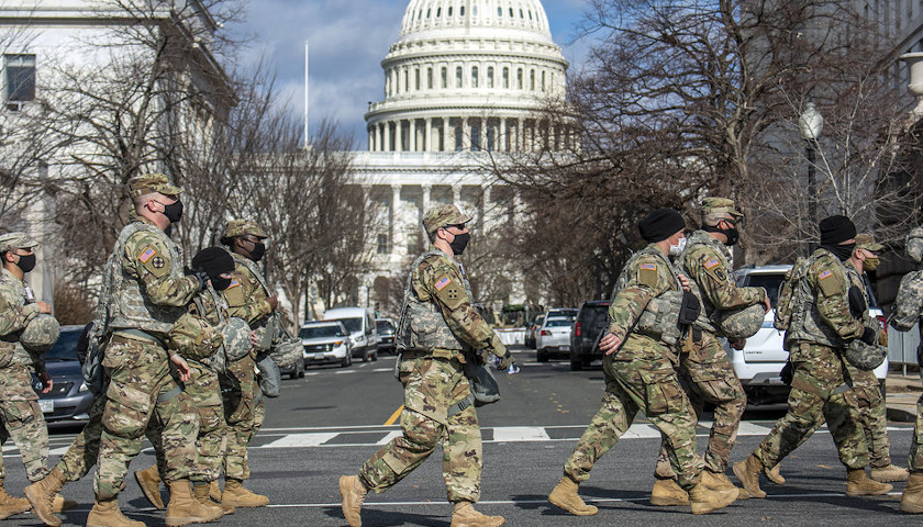 Nearly 5,000 National Guard Troops to Stay in DC Until Mid-March Amid Concerns That QAnon Will Storm Capitol Again