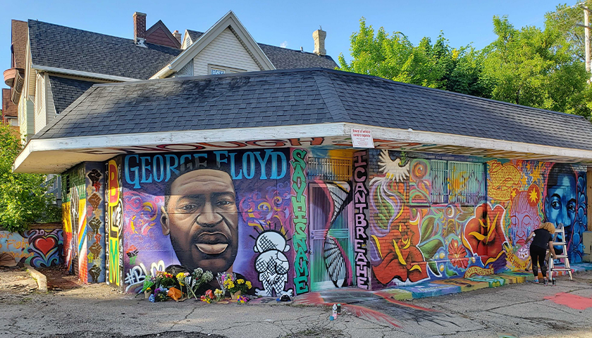 Mural of George Floyd on the side of a building