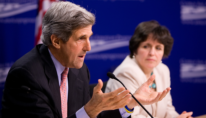 John Kerry with Sarah Rosen Wartell in background