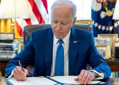 President Joe Biden signing a bill