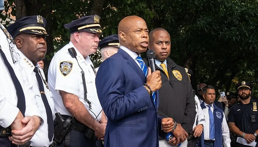 New York Coty Mayor Eric Adams with NYPD officers